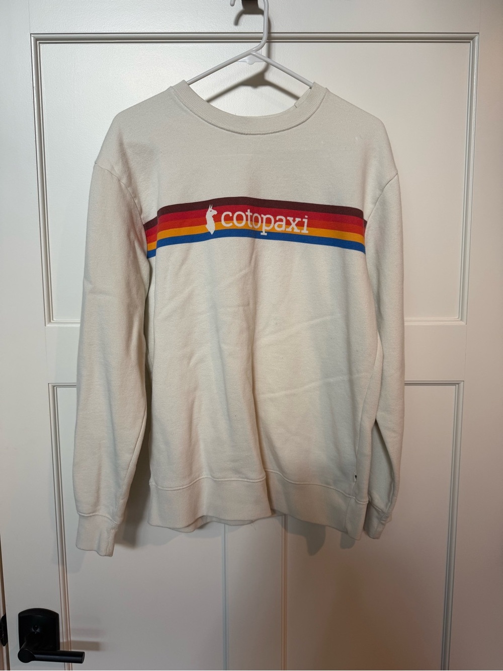 Cotopaxi Cream Crewneck Sweater with Rainbow Stripe